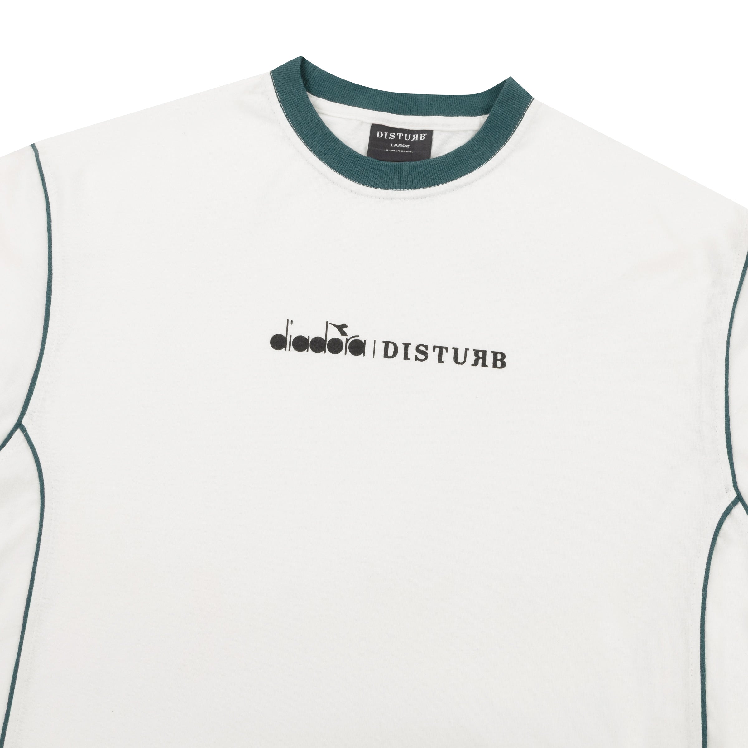 CAMISA DISTURB x DIADORA WHITE